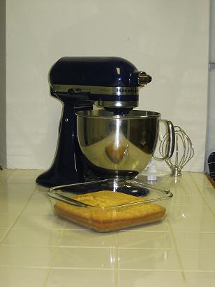 it\'s hard to see the corn bread over the gleam of the kitchen aid